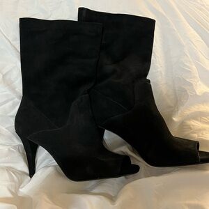 Black suede open toed heeled booties.
